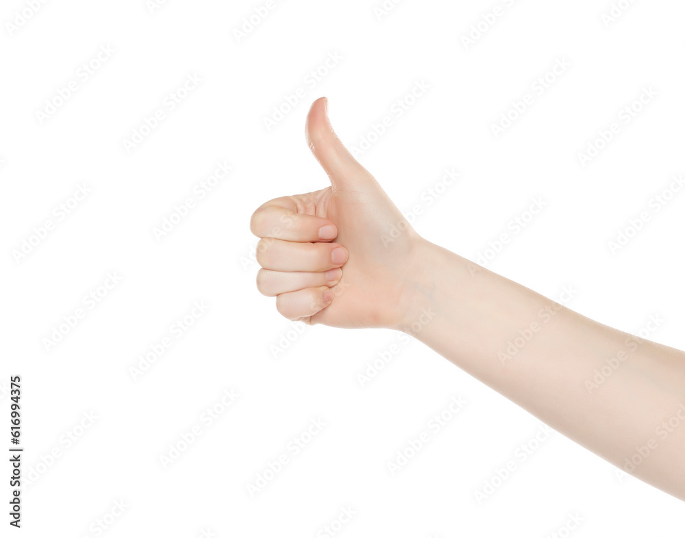 Female hand gesture - thumbs up, isolated on a white background. Close up. Female hand gesture - thumbs up, isolated on a white background. Close up.