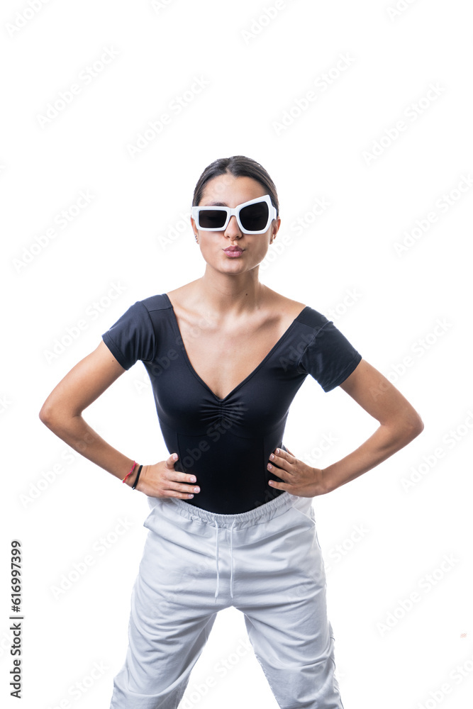 Studio portrait of young brunette model woman wearing funny fancy white sun glasses sending kisses Studio portrait of young brunette model woman wearing funny fancy white sun glasses sending kisses