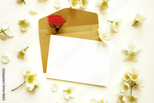 Fototapeta Naklejka Na Ścianę i Meble -  envelope and jasmine, rose flowers
