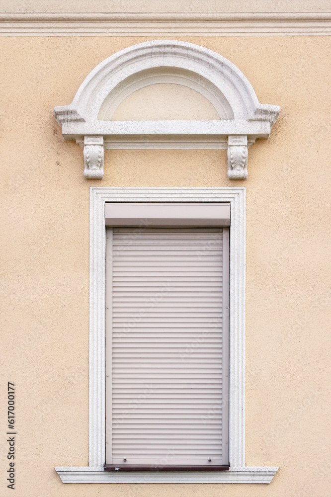 Fototapeta premium modern windows on the grunge facade. ancient architecture