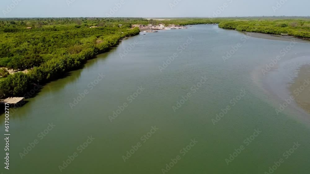 Aerial pull-out view of River Gambia shot at Stala Adventures, Kartong - The Gambia Aerial pull-out view of River Gambia shot at Stala Adventures, Kartong - The Gambia