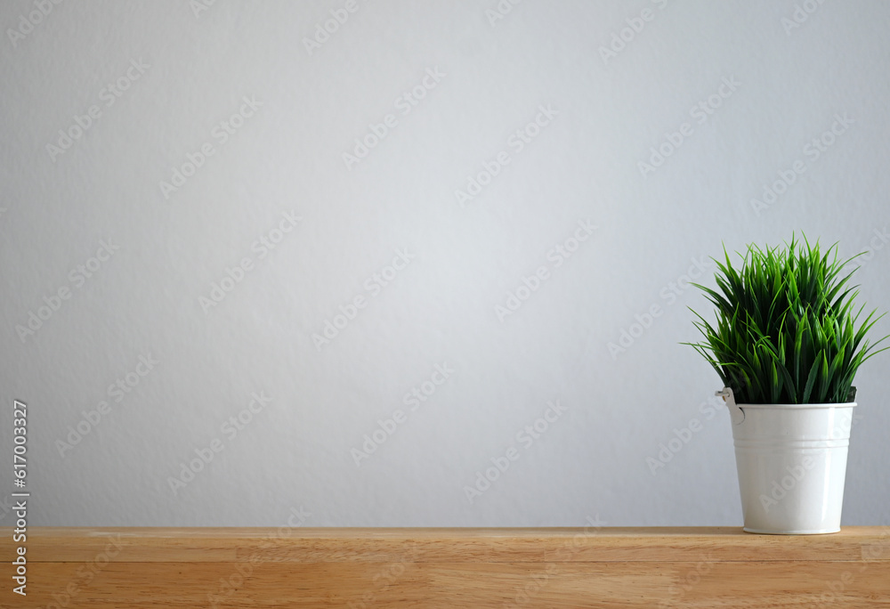 Fototapeta premium Nature's Serenity Grass on Wooden Table, Front View with Free Space