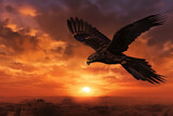 A striking silhouette of a falcon in flight set against a dramatic Middle Eastern sunset, embodying the freedom and majesty of the region's native wildlife.