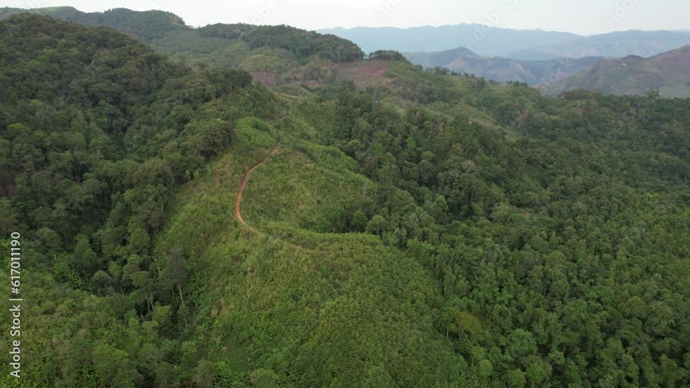 Aerial landscape view of greenery rainforest mountains by drone Aerial landscape view of greenery rainforest mountains by drone