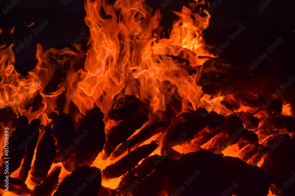 Fire flames on black background, Blaze fire flame texture background, Beautifully, the fire is burning, Fire flames with wood and cow dung bonfire Fire flames on black background, Blaze fire flame texture background, Beautifully, the fire is burning, Fire flames with wood and cow dung bonfire