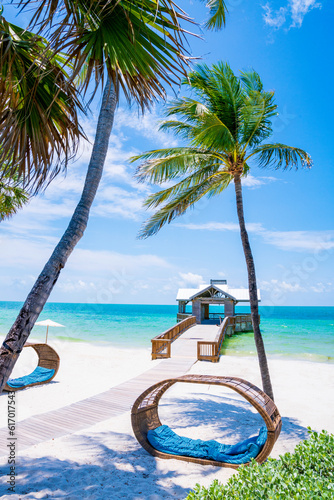Fototapeta Tropical Beach with Wooden Pier, Key West, Florida, USA