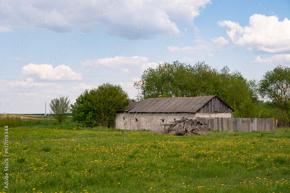 Old brick house in the field in Belarus Old brick house in the field in Belarus
