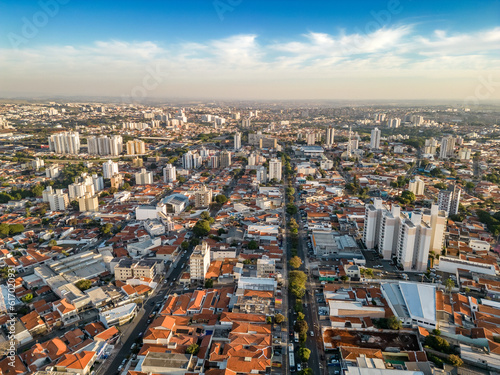 Campinas  Sao Paulo  Brazil. June 23  2023. Aerial image of three central districts of Campinas  Vila Itapura  Cambu   and Jardim Guanabara. Sunset and blue sky.