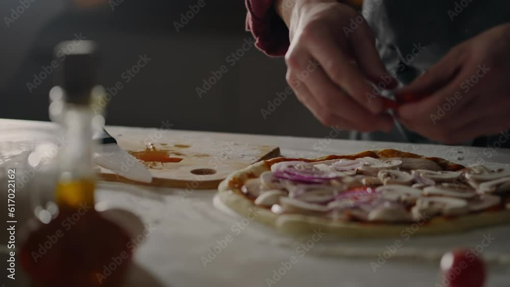 Margarita, Fast food baker Confidently Spreads adds red pieces of tomato at the baker's workplace Close-up Junior specialist Is at the workplace Place of delivery of food orders, cooking pizza Margarita, Fast food baker Confidently Spreads adds red pieces of tomato at the baker's workplace Close-up Junior specialist Is at the workplace Place of delivery of food orders, cooking pizza