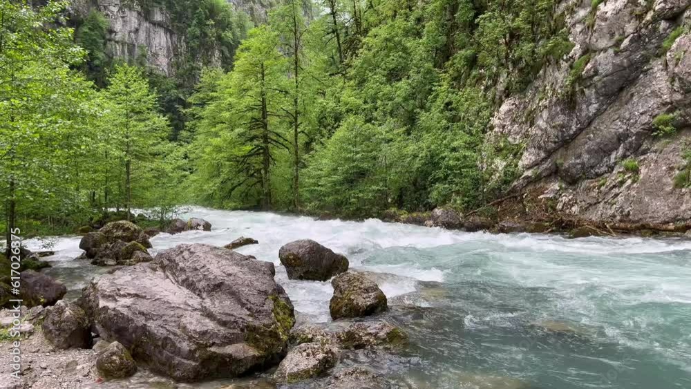 Mountain river with old rock bridge . Static beautiful foggy landscape view after rain.
Mountain river with old rock bridge . Static beautiful foggy landscape view after rain.