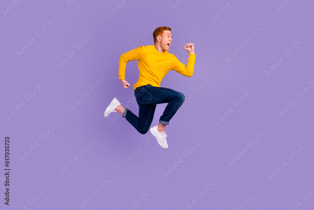 Full length profile photo of cheerful man run look empty space isolated on violet color background