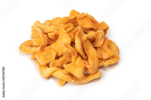 Dried melon slices isolated on a white background.