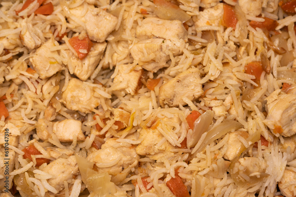 Tasty pilaf with chicken as background. Tasty pilaf with chicken as background.