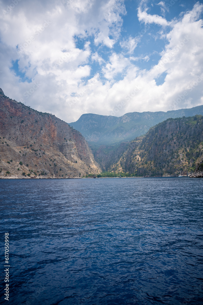 View from water of Butterfly Valley in Oludeniz Fethiye in the morning, Turkey
