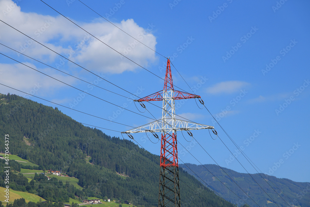 Red and white power poles in Tyrol - Austria
Red and white power poles in Tyrol - Austria