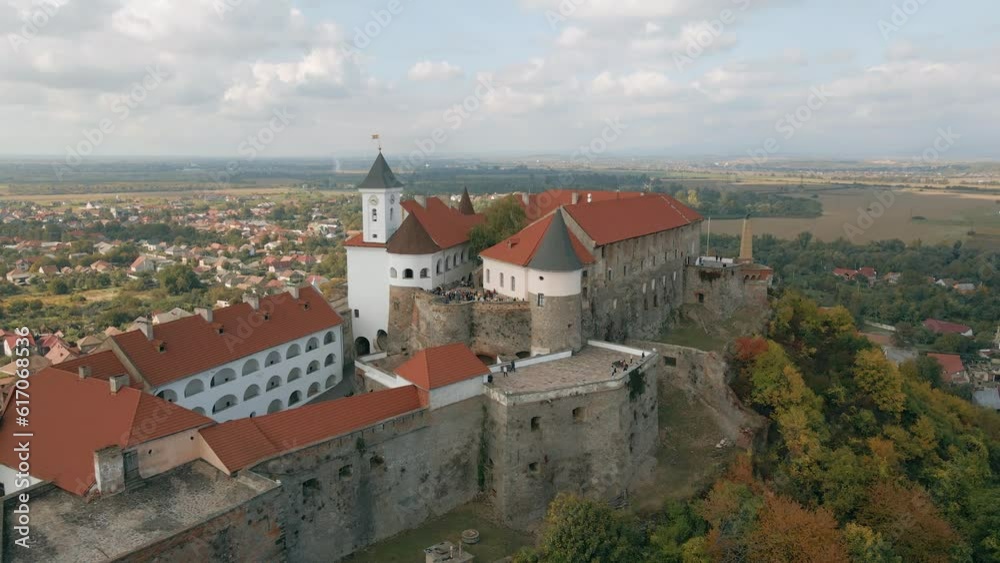 Panoramic aerial view to Palanok Castle of Mukachevo. Historic castle in western Ukraine. Panoramic aerial view to Palanok Castle of Mukachevo. Historic castle in western Ukraine.
