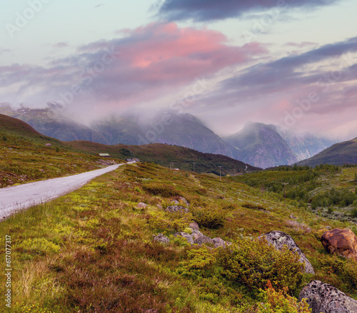 Summer mountain cloudy countryside landscape from Aurlandsfjellet National Scenic Route highlands road, Norway