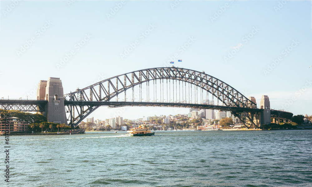 The Sydney Harbour Bridge is a steel through arch bridge in Sydney, spanning Sydney Harbour from the central business district to the North Shore