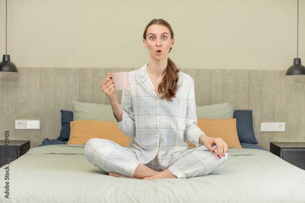 feeling extremely shocked and surprised. bed time concept feeling extremely shocked and surprised. bed time concept