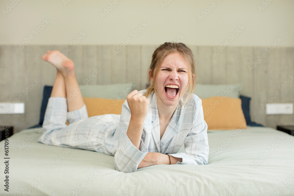 young pretty woman looking angry, annoyed and frustrated. nightwear concept young pretty woman looking angry, annoyed and frustrated. nightwear concept