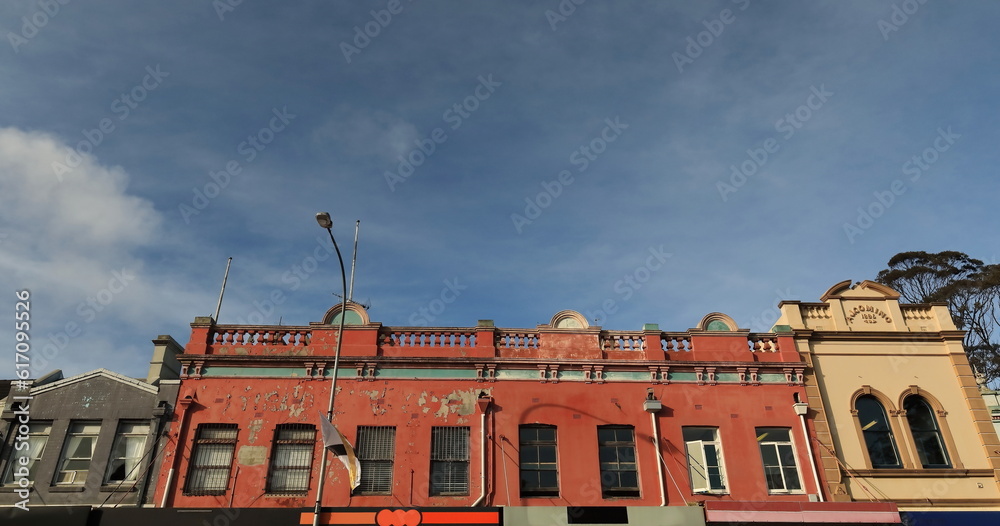 Types of roof parapets of multicolored historic buildings on Oxford Street, Paddington. Sydney-Australia-700