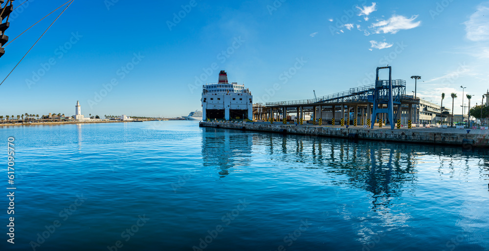 Panoramic view of Malaga port on sunset in Malaga, Spain on January 14, 2023