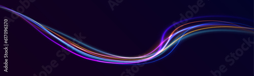 Abstract neon color wave lights background. Dynamic composition of bright lines forming lights path of speed movement, futuristic dark background, graphic design element	