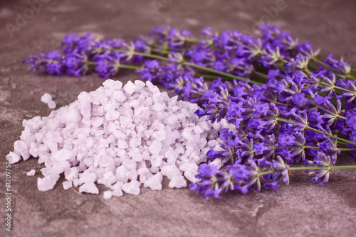 Bath salts with the scent of lavender and fresh lavender flowers.
