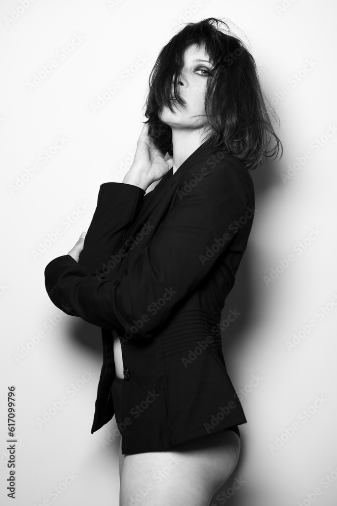 Portrait of an adult woman black and white on a black background Portrait of an adult woman black and white on a black background