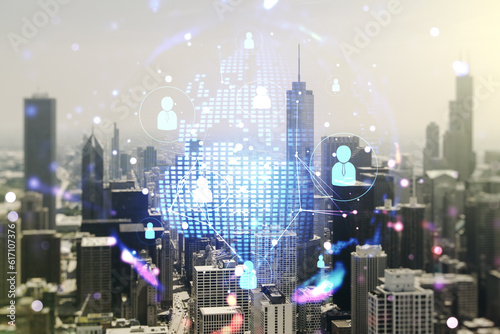 Virtual social network media hologram and world map on Chicago cityscape background. Double exposure