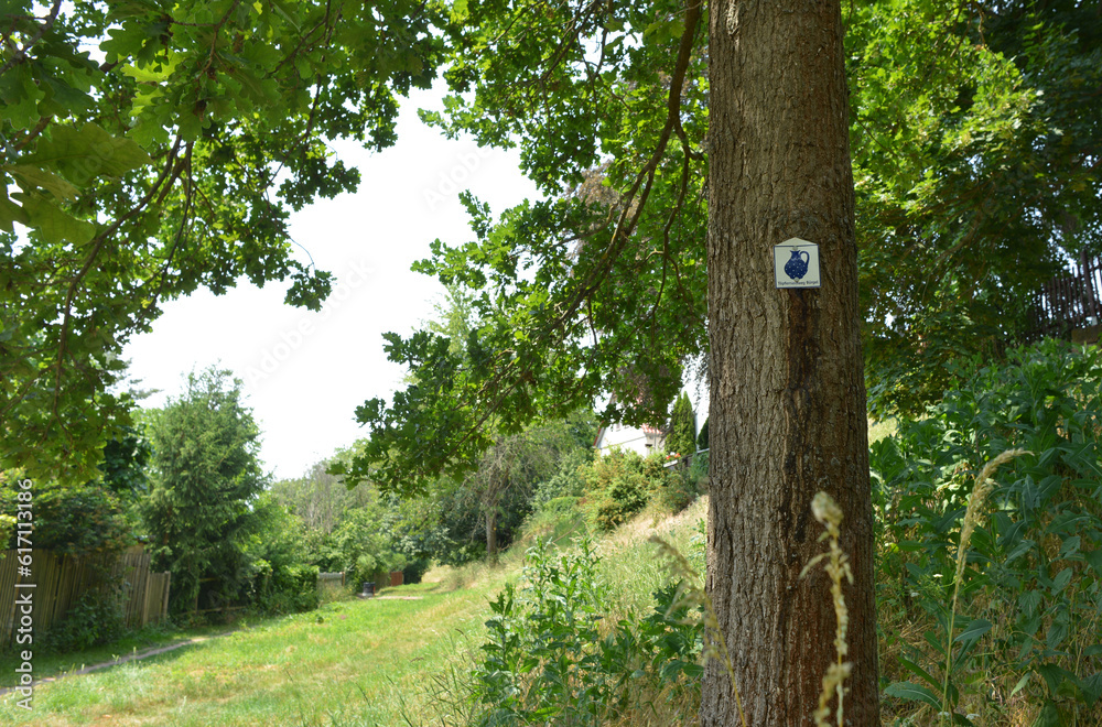 Fototapeta premium Bürgel, Germany, sign of the pottery circular trail on a tree