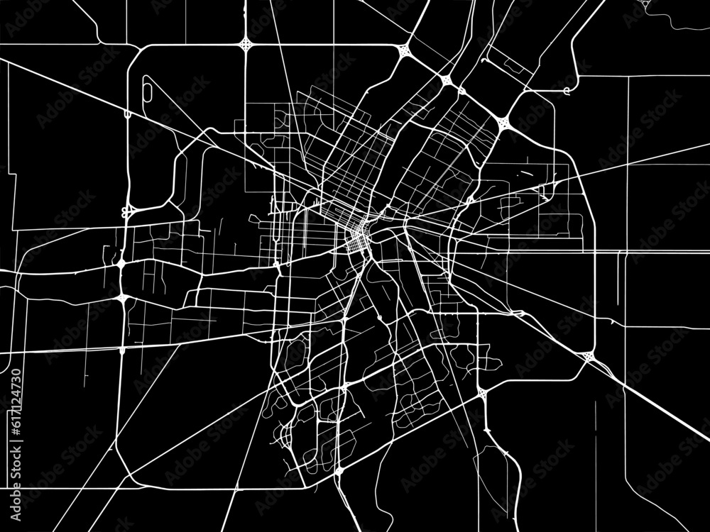Vector road map of the city of  Winnipeg Manitoba in Canada with white roads on a black background.