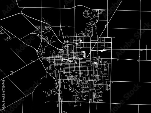 Vector road map of the city of  St. Thomas Ontario in Canada with white roads on a black background.