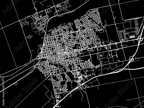 Vector road map of the city of  Woodstock Ontario in Canada with white roads on a black background. photo