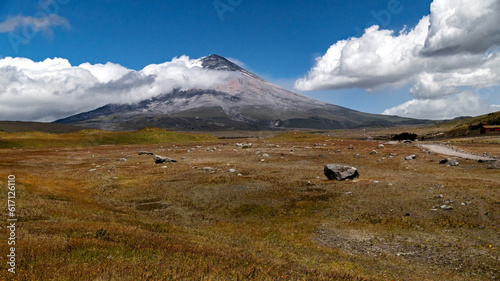 Cotopaxi volcano which has been throwing out ash, has one of its cone sides completely covered in it. Photos taken with ND filters to capture the moving clouds. National Park, Ecuador.