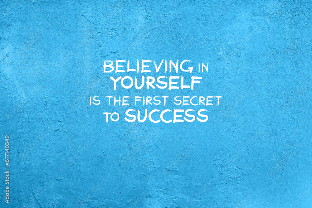 Blue concrete wall with inspirational quotes - Believing in yourself is the first secret to ...