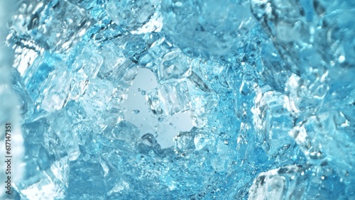 Texture of splashing water with ice cubes, tunnel shape.