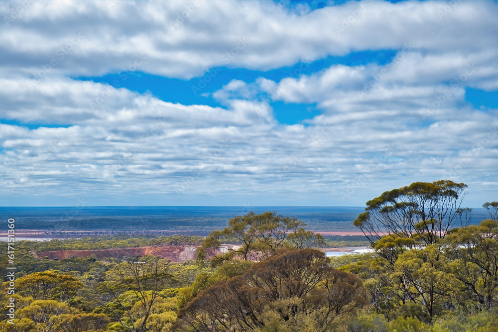 Panoramic view from Beacon Hill in Norseman, Western Australia, across a salt lake, an open pit gold mine and the Great Western Woodlands
