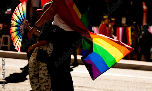Bandeira colorida, símbolo do orgulho gay LGBT+, tremulando na Avenida Paulista durante a 27ª edição, da Parada do Orgulho LGBT+ de São Paulo, Brasil.   photo