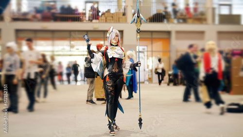 Exquisite Anime Girl Fighter With Staff Cosplay Moments at the Anime Convention