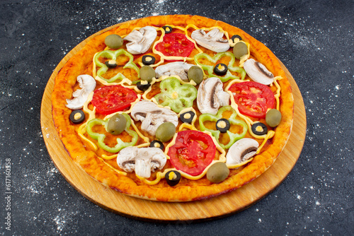 front view delicious mushroom pizza with red tomatoes bell-peppers olives and mushrooms all sliced inside on the grey desk food meal pizza italian