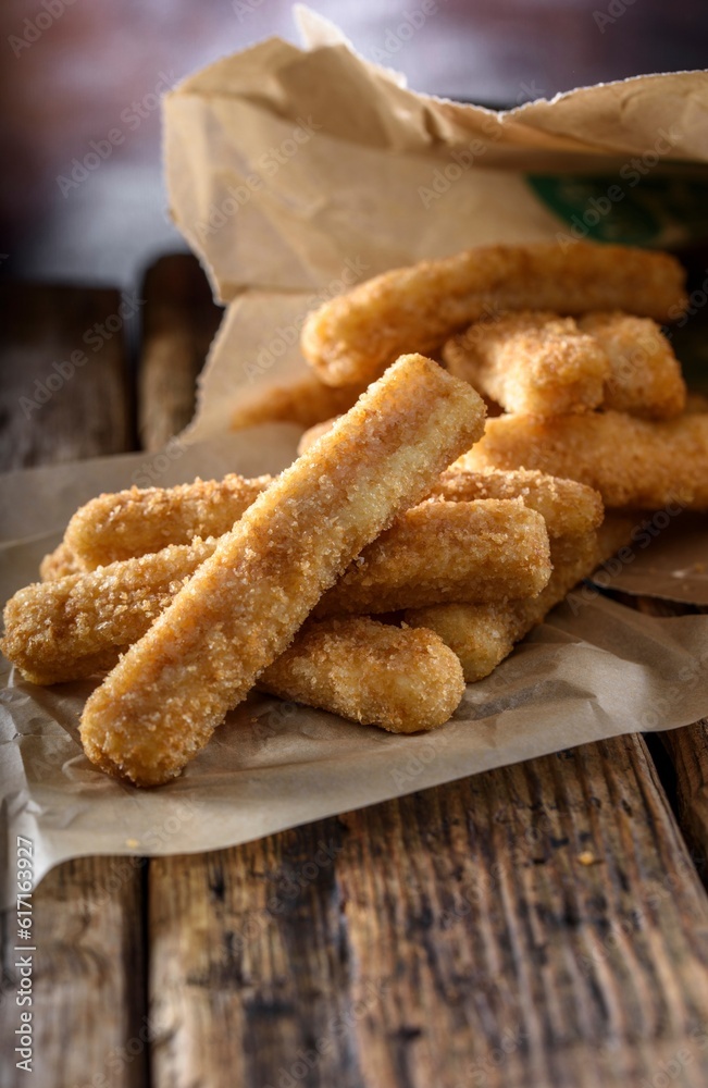 Crispy and Zesty: Panko-Breaded Fish Sticks with Lemon in Exquisite 4K Close-U Crispy and Zesty: Panko-Breaded Fish Sticks with Lemon in Exquisite 4K Close-U