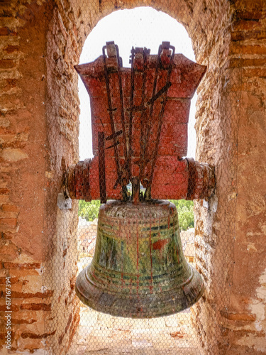 Ancient bell installed in the tower of a church
