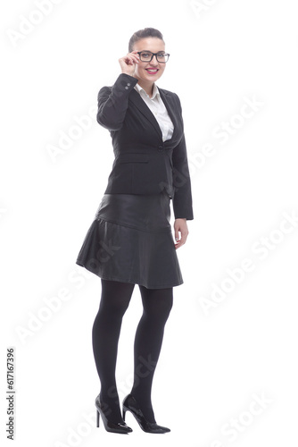 in full growth. smiling businesswoman looking through glasses