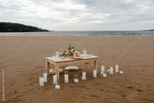 Table setup for boho style beach elopement