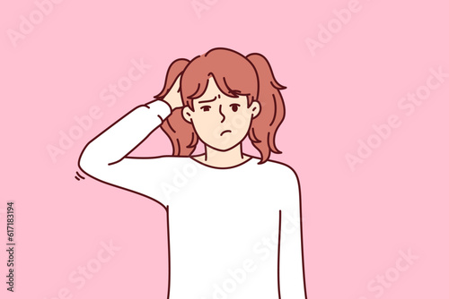 Confused little girl scratching head and looking at screen not knowing right answer to question or trying to make difficult choice. Confused child teenager guilty having committed prank