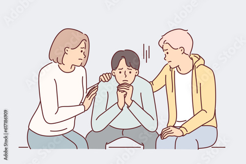 Friends console depressed man suffering from stress after breaking up with girlfriend
