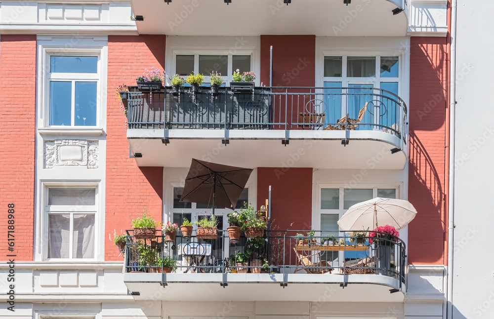 city summer balcony with flowers and plants