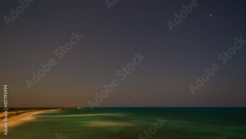 Ocean timelapse with clouds and stars