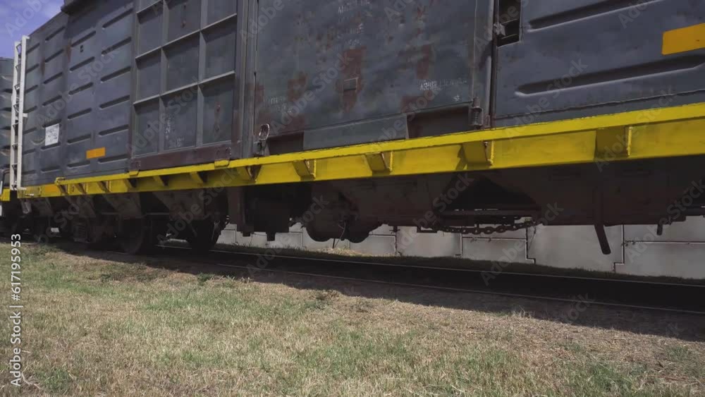 Freight train wagons moving on tracks Freight train wagons moving on tracks